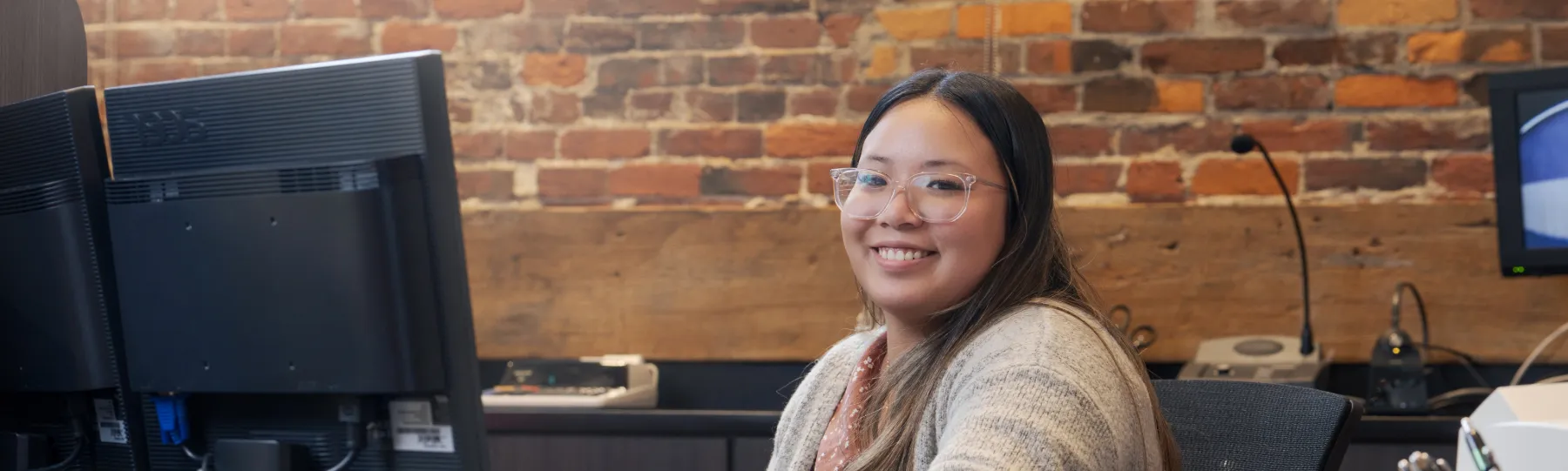 Woman at desk with computer