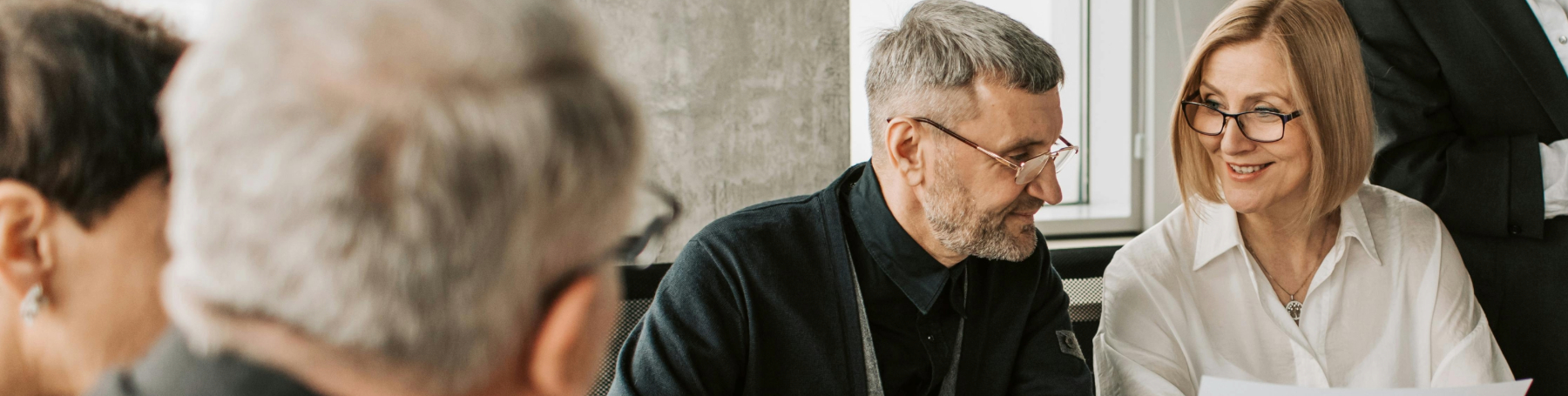 Two people reviewing documents