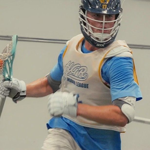 Boy playing lacrosse