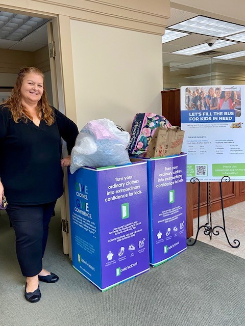 Dracut Assistant Branch Manager, Beth McArdle with donations